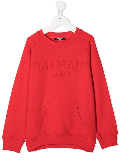 Shop Balmain Embossed Logo Crew Neck Sweatshirt In Red