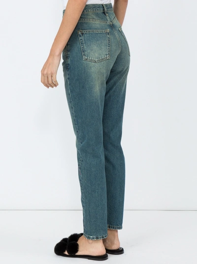 Shop Saint Laurent Embroidered High-rise Jeans