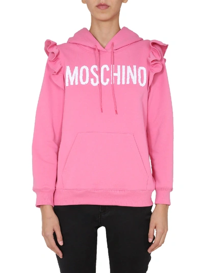 Shop Moschino Hoodie In Rosa