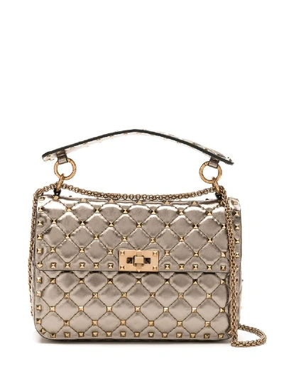 Shop Valentino Rockstud Spike Crossbody Bag In Gold