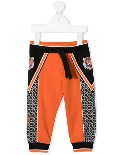 Shop Dolce & Gabbana Tiger Embroidered Track Pants In Orange