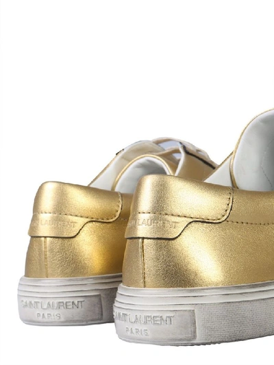 Shop Saint Laurent Women's Gold Leather Sneakers