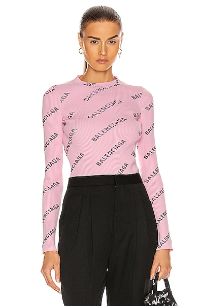 Shop Balenciaga Long Sleeve Logo Top In Light Pink & Black