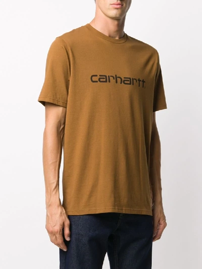 Shop Carhartt Crew Neck Logo Print T-shirt In Brown