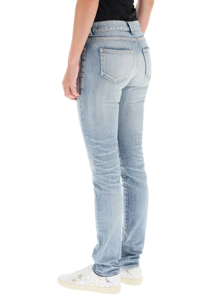 Shop Saint Laurent Low-rise Jeans In Light Blue