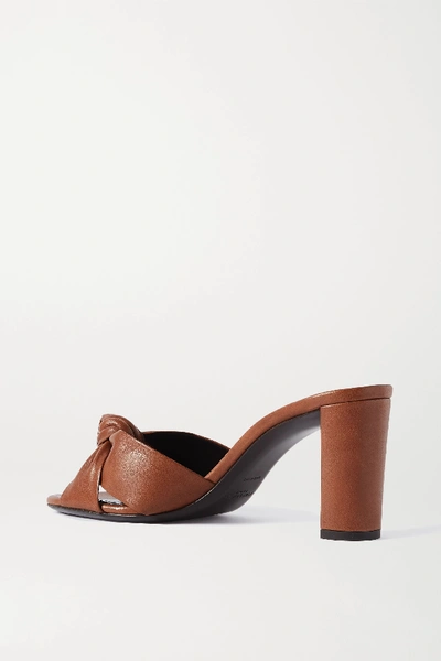 Shop Saint Laurent Bianca Knotted Leather Mules In Tan