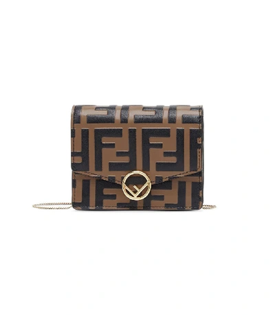 Shop Fendi Ff Monogram Mini Bag In Brown