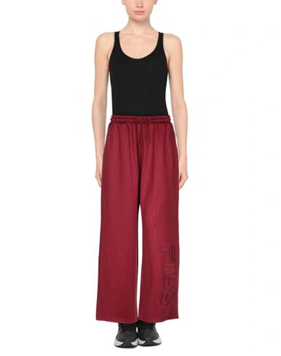 Shop Fila Casual Pants In Maroon