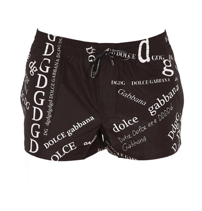 Shop Dolce & Gabbana Allover Logo Swim Shorts In Black