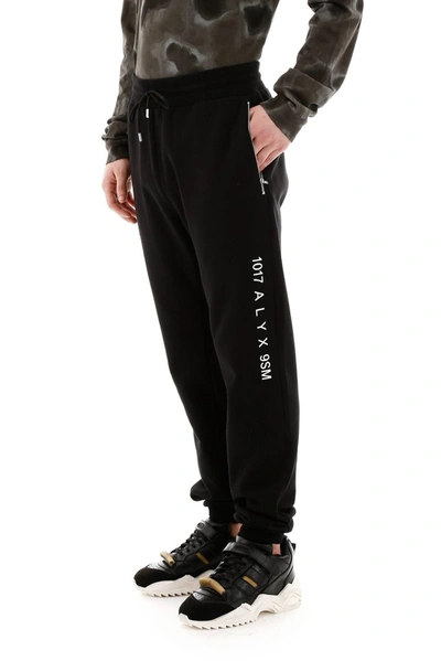 Shop Alyx 1017  9sm Logo Track Pants In Black