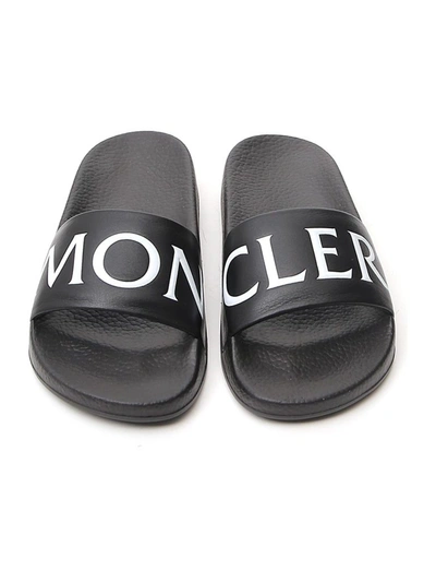 Shop Moncler Logo Slippers In Black