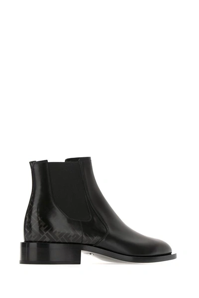 Shop Fendi Ff Logo Ankle Boots In Black