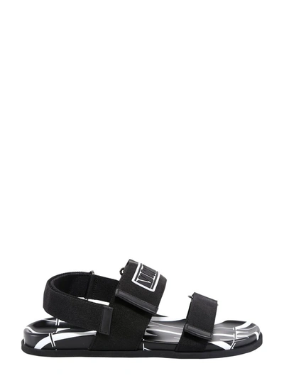 Shop Valentino Vltn Sandals In Black