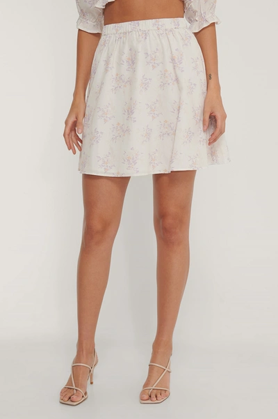 Shop Kae Sutherland X Na-kd High Waist Mini Skirt - Offwhite In Lilac Flower