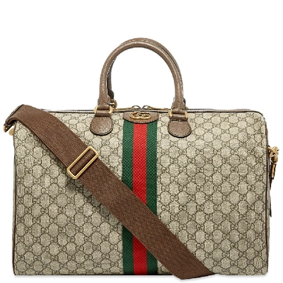 Shop Gucci Ophidia Gg Duffel Bag In Neutrals