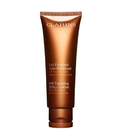 Shop Clarins Self Tanning Milky-lotion For Face And Body In N/a