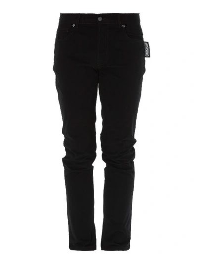 Shop Moschino Tapered Stretch Denim Jeans In Black