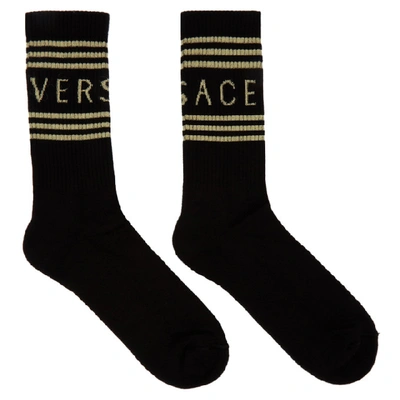Shop Versace Black And Gold Logo Socks In I450 Black