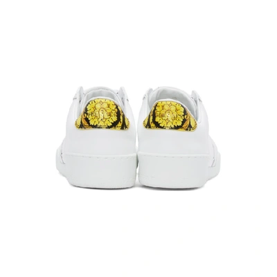Shop Versace White Ilus Sneakers In Dbn9 White