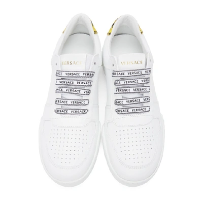 Shop Versace White Ilus Sneakers In Dbn9 White