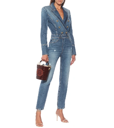 Shop Balmain Distressed Denim Jumpsuit In Blue