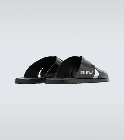 Shop Balenciaga Logo Leather Sandals In Black
