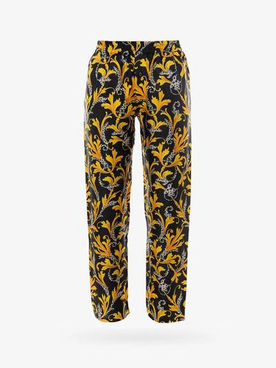 Shop Versace Trousers In Yellow