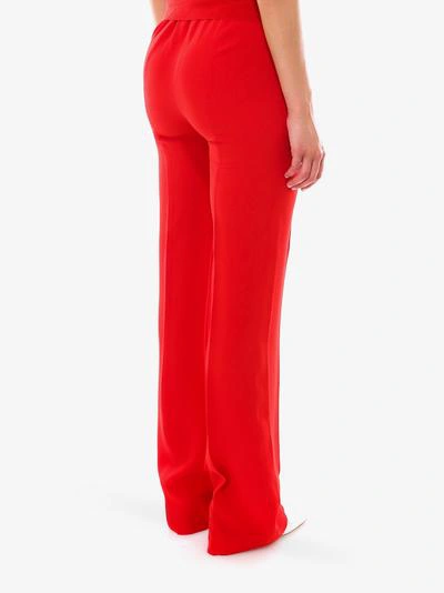 Shop Prada Trousers In Red