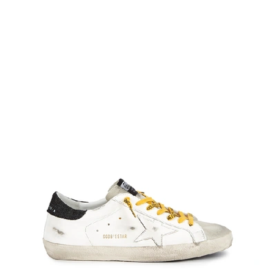 Shop Golden Goose Superstar Distressed Leather Sneakers In White And Black