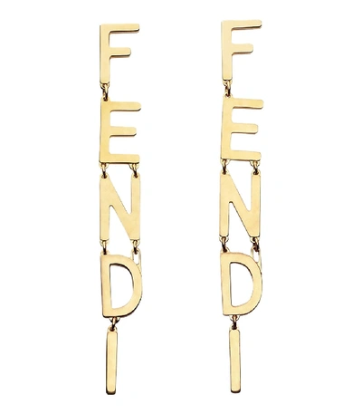 Shop Fendi Logo Sting Earrings In Gold