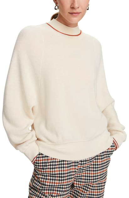 white mock neck sweater