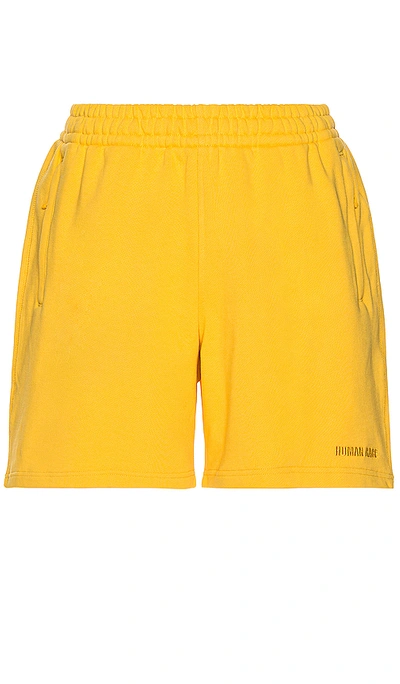 Shop Adidas X Pharrell Williams Basics Short In Yellow