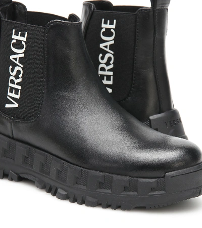 Shop Versace Leather Ankle Boots In Black