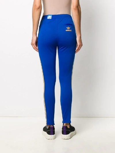 Shop Adidas Originals Skinny Stirrup Track Pants In Blue