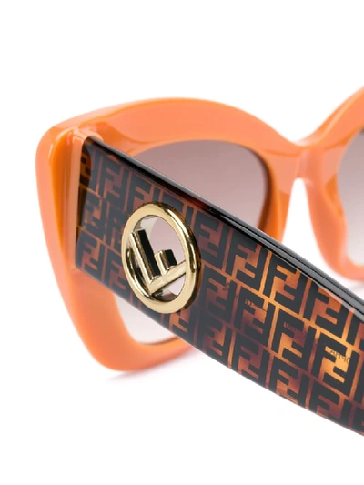 Shop Fendi Cat Eye Monogram Print Sunglasses In Orange