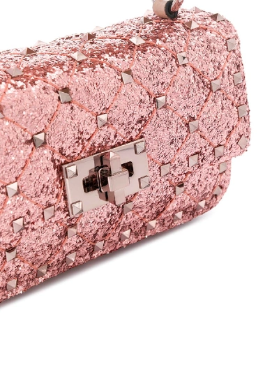 Shop Valentino Rockstud Spike Mini Leather Shoulder Bag In Pink