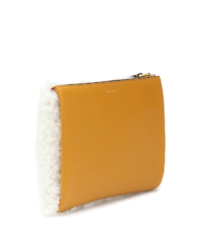 Shop Marni Shearling And Leather Clutch In White