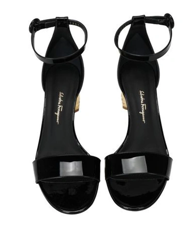 Shop Ferragamo Sandals In Black