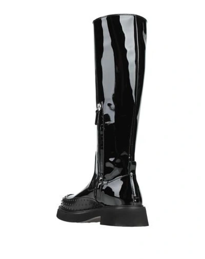 Tod's Knee Boots In Black
