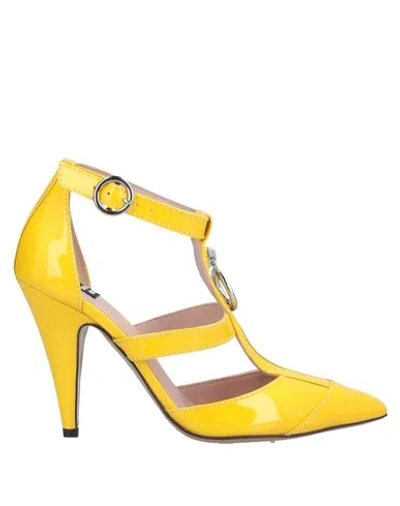 Shop Boutique Moschino Pumps In Yellow