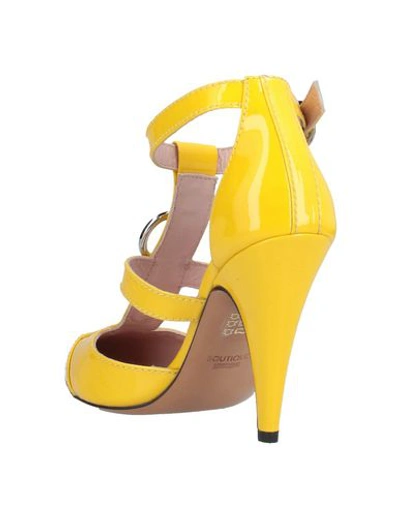 Shop Boutique Moschino Pumps In Yellow