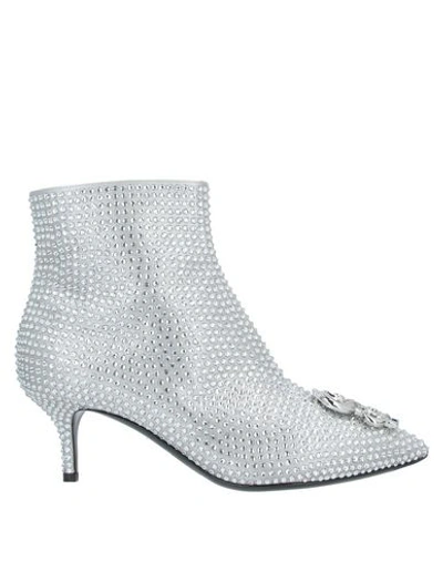 Shop Moschino Ankle Boots In Light Grey