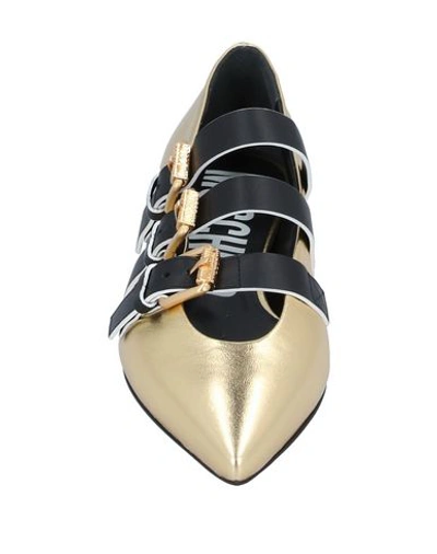 Shop Moschino Ballet Flats In Gold