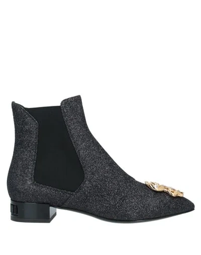 Shop Moschino Ankle Boot In Black