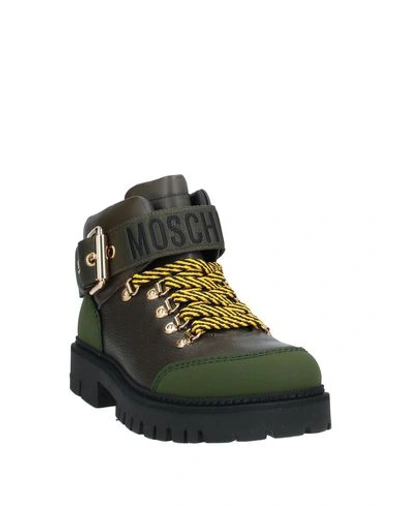 Shop Moschino Ankle Boots In Military Green