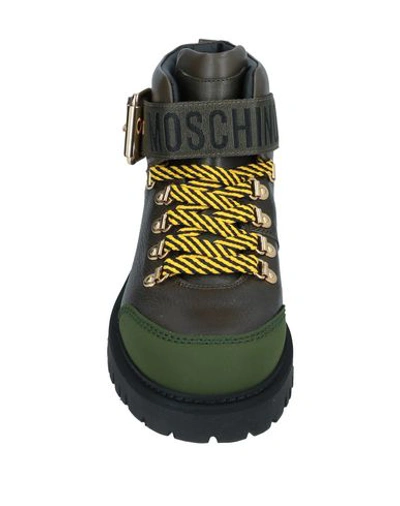 Shop Moschino Ankle Boots In Military Green