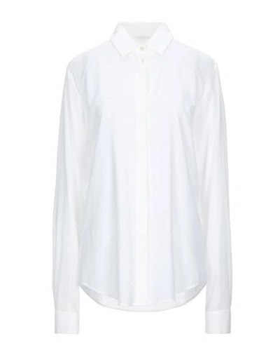 Shop Saint Laurent Solid Color Shirts & Blouses In White