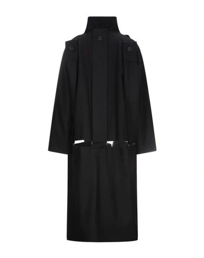 Shop Yohji Yamamoto Coats In Black