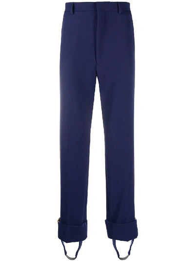 Shop Prada Side-stripe Stirrup Trousers In Blau