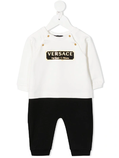 Shop Young Versace Logo Long-sleeve Rompler In White
